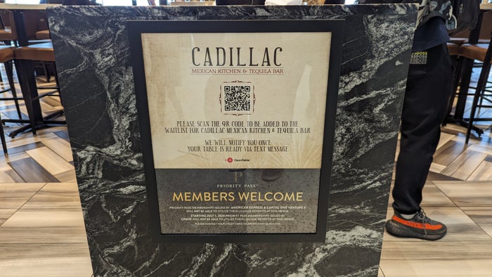 IAH to LAS Terminal A Cadillac Bar Priority Pass sign IAH to LAS Terminal A Cadillac Bar Priority Pass sign