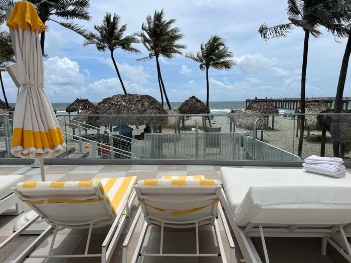 Daybeds and chairs at the ocean at Newport Beachside hotel in Miami Daybeds and chairs at the ocean at Newport Beachside hotel in Miami