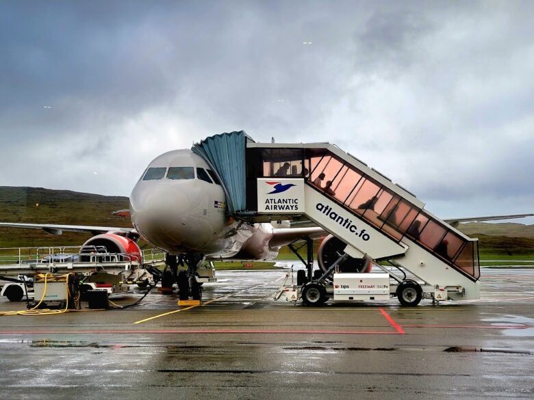 Plane on tarmac bad weather