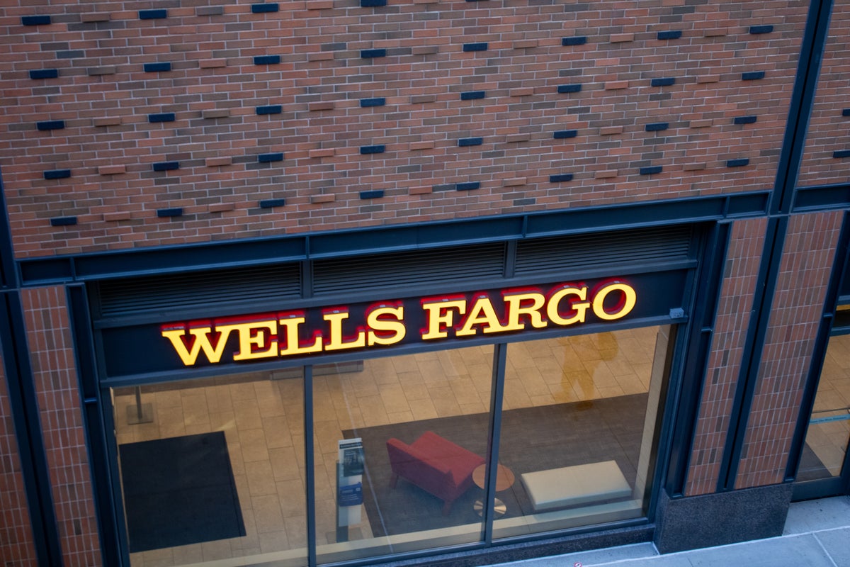 a wells fargo sign in a store window looking down