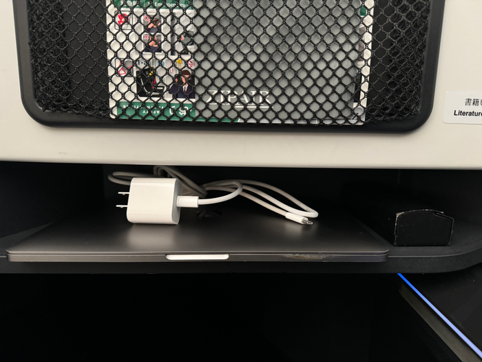 Zipair LAX NRT business class storage at front of seat