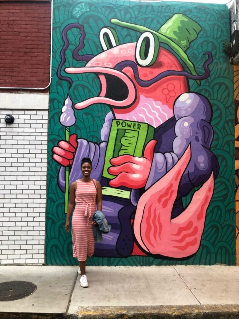 Ashley in front of some street art in Memphis, Tennessee.