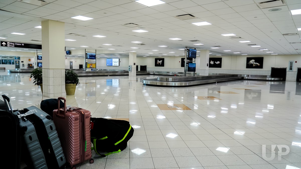 Airport Baggage Claim With Checked Bags Upgraded Points LLC 2