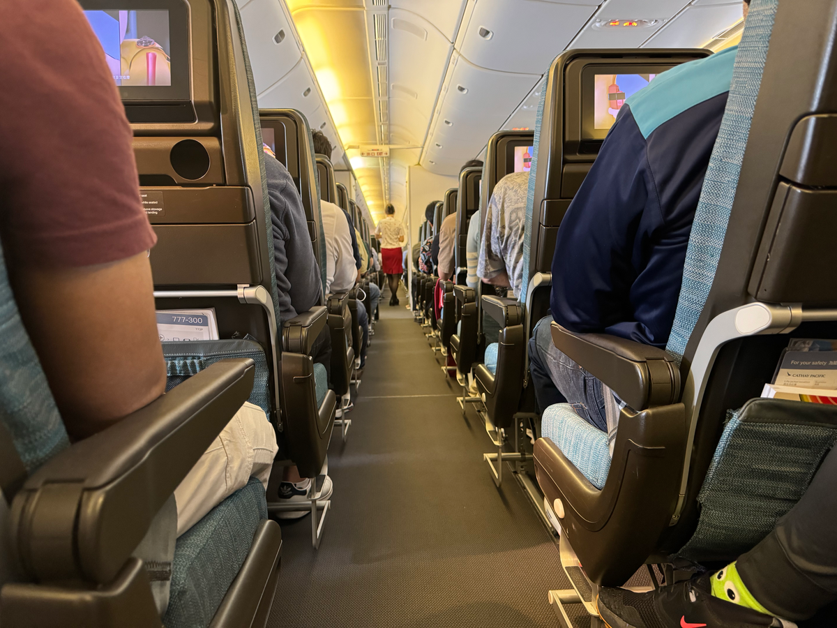 Cathay Pacific B777 300 economy aisle