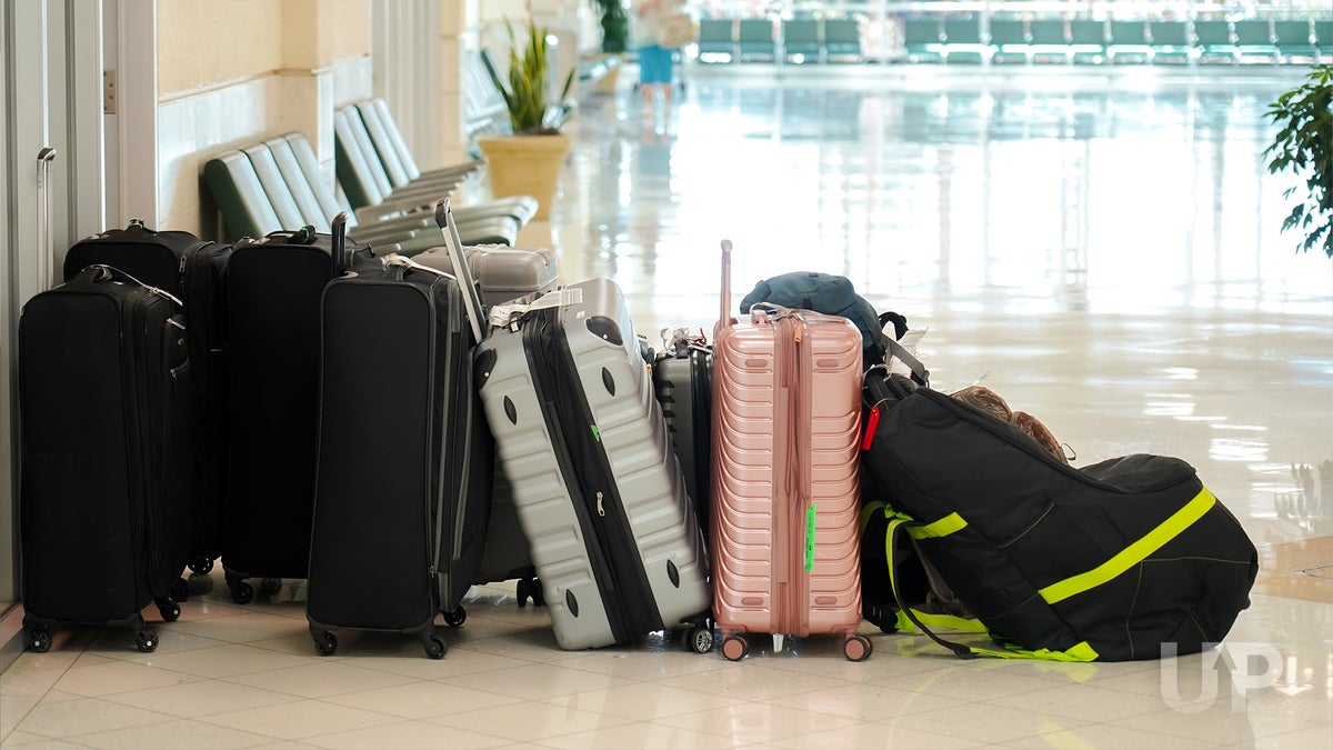 Do I Need To Pay With My Airline Credit Card To Get Free Checked Bags and Perks?