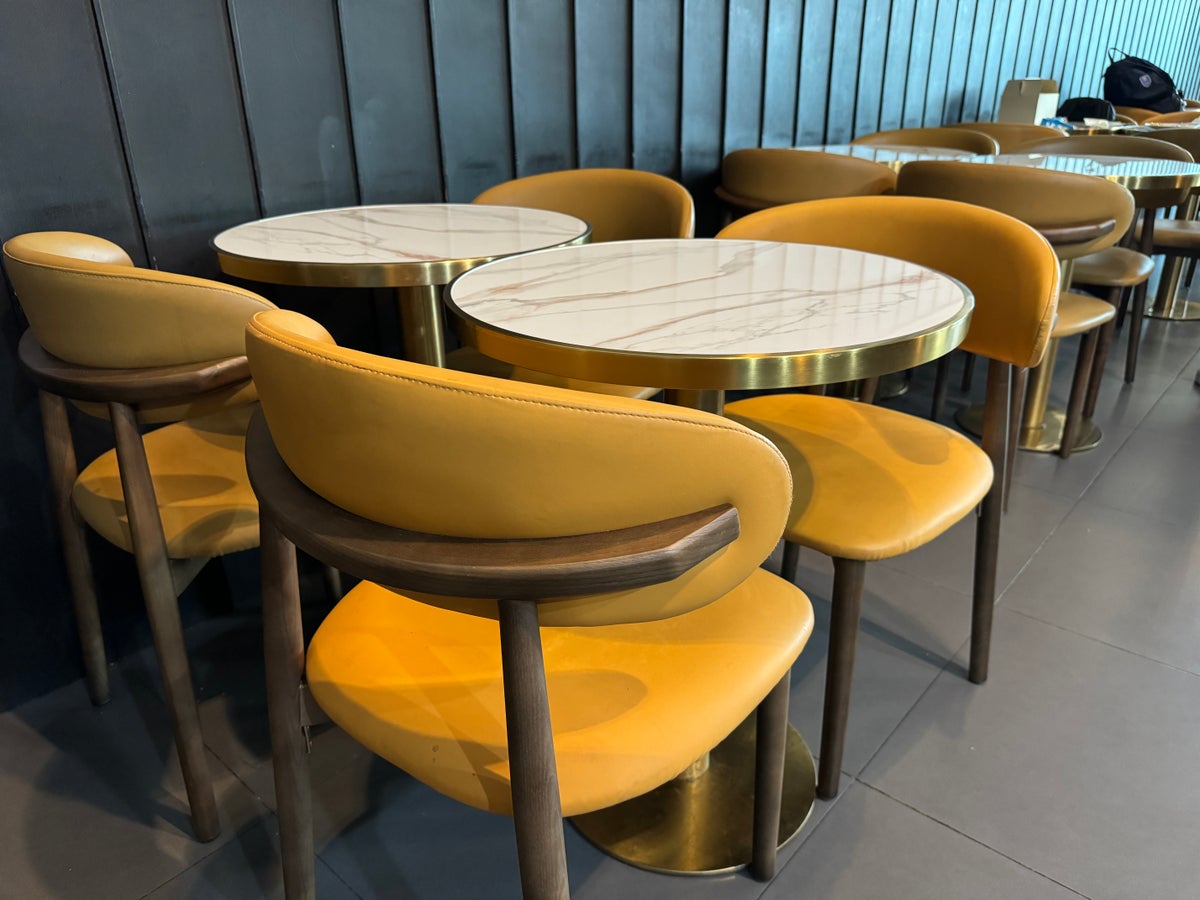 Coral Premium Departure Lounge HKT dining tables