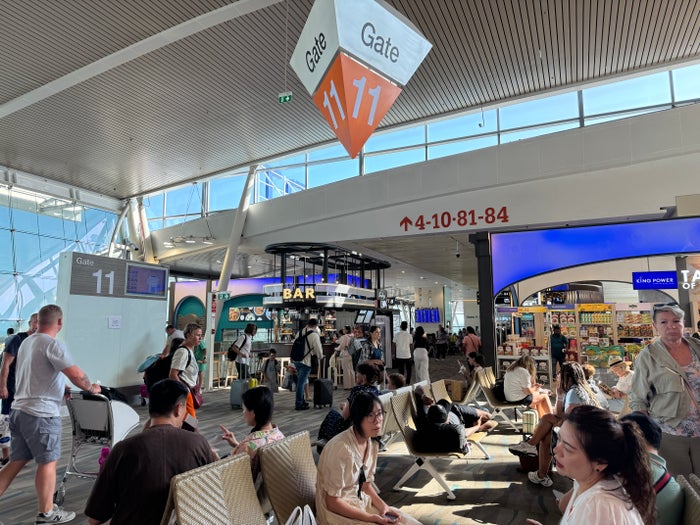 Coral Premium Departure Lounge HKT path to lounge by gate 11 Coral Premium Departure Lounge HKT path to lounge by gate 11