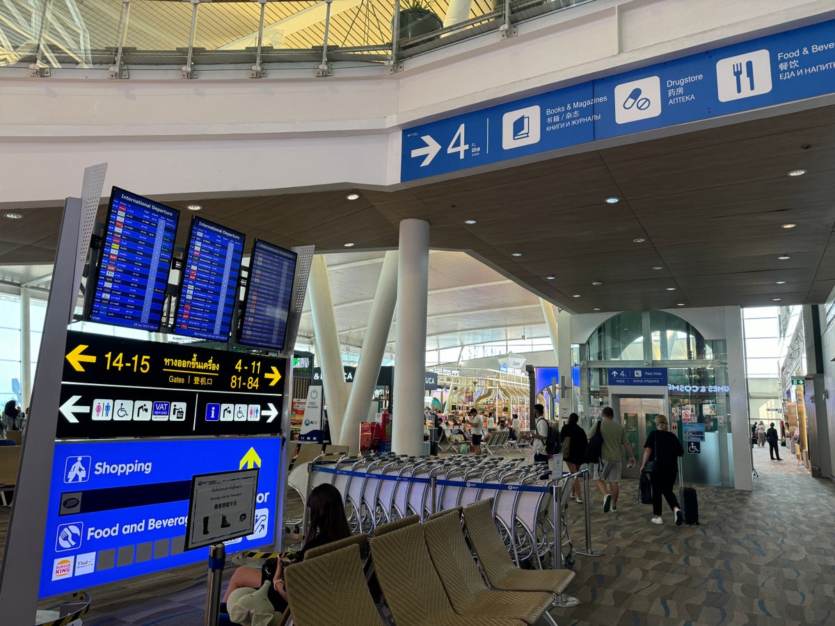 Coral Premium Departure Lounge HKT signage after security