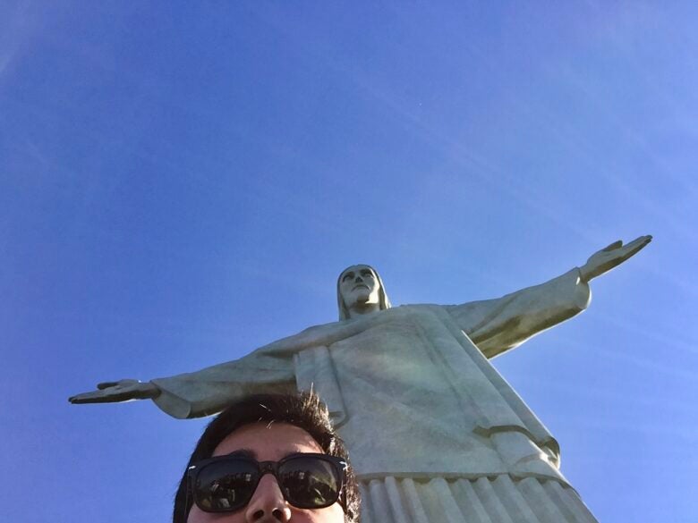 Attempting to get a selfie with the Christ the Redeemer statue in Rio de Janeiro, Brazil.