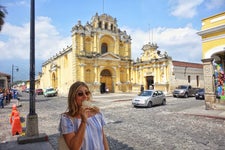 Lori eating street food in Antigua, Guatemala.