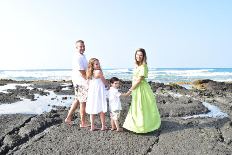 Family photos on lava in Hawaii