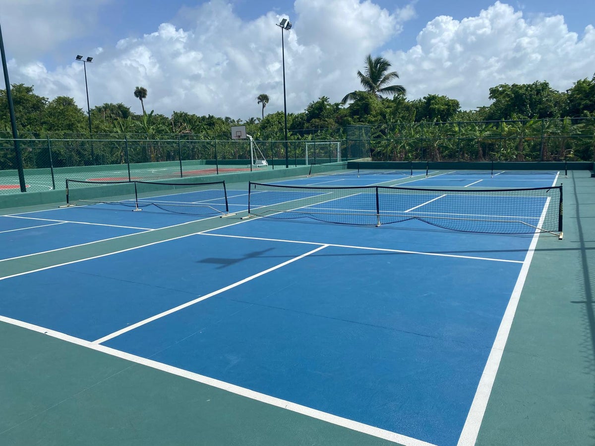 Iberostar Selection Bavaro Suites blue and green tennis courts