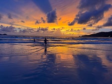 My kids at sunset at Patong Beach, Phuket, Thailand.