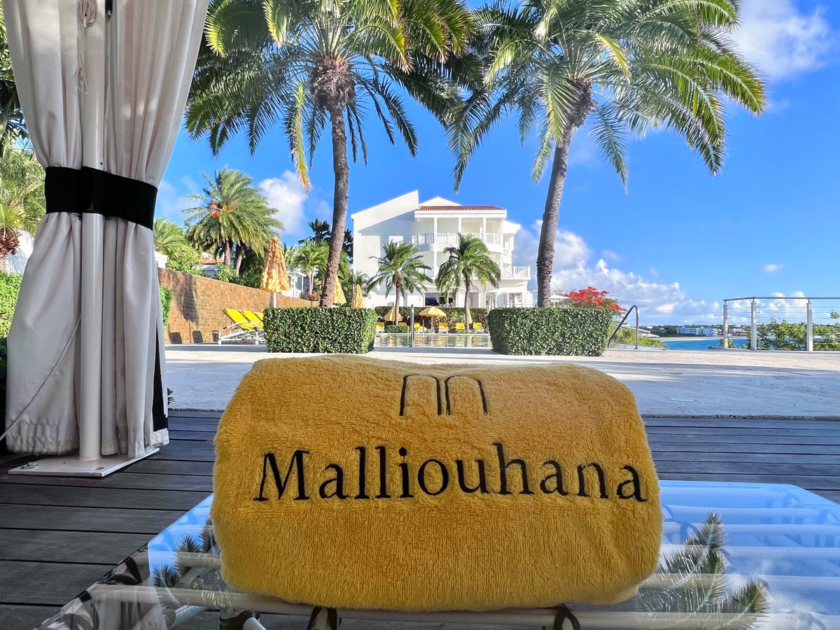 Malliouhana towel by pool 