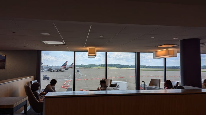 PIT The Club lounge apron view seating from the bar PIT The Club lounge apron view seating from the bar