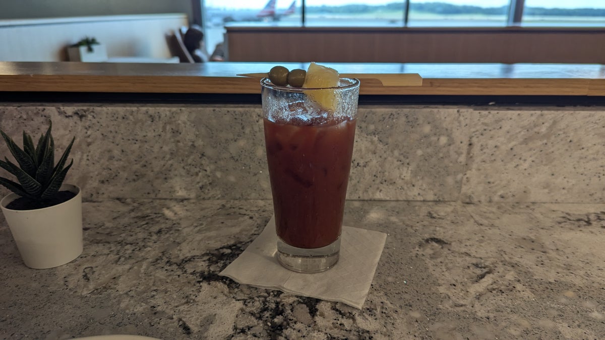 PIT The Club lounge food and beverage bloody mary