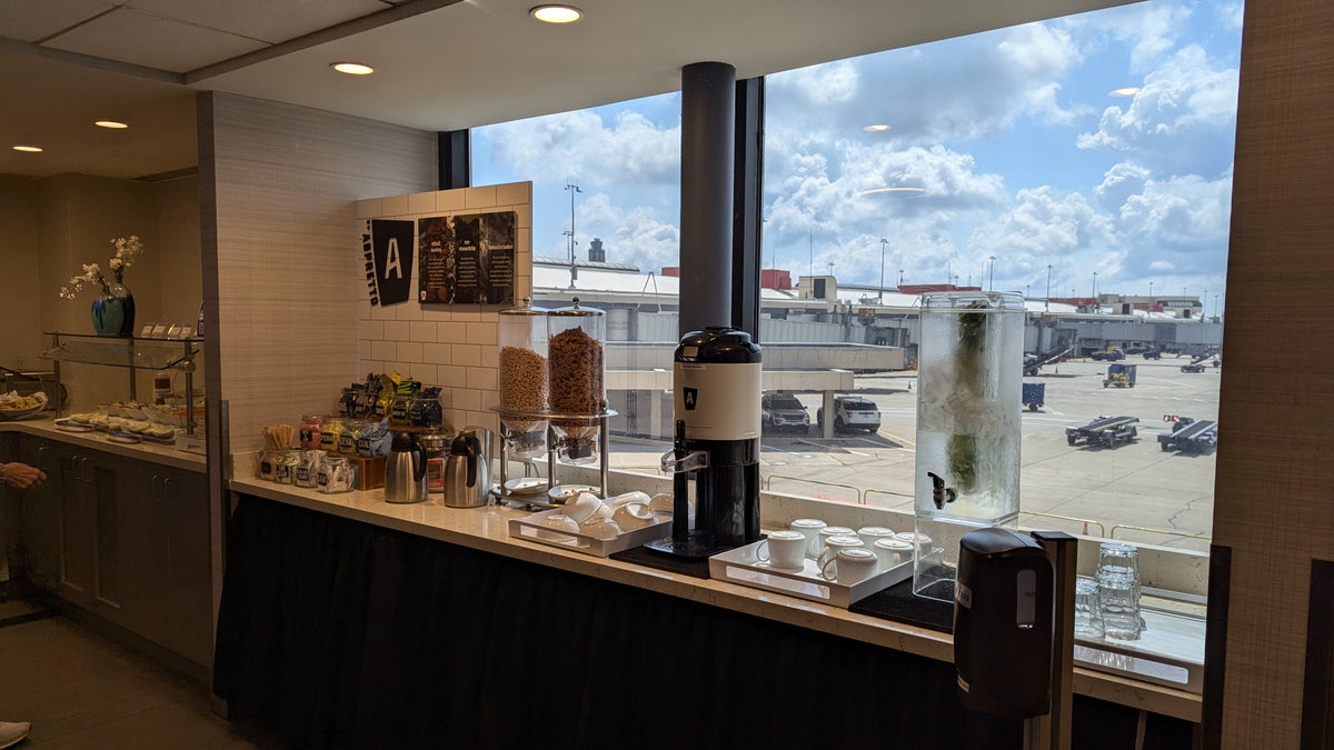 PIT The Club lounge food and beverage coffee and water