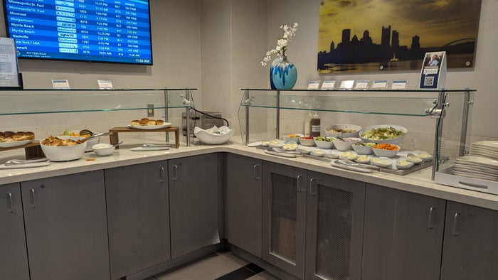 PIT The Club lounge food and beverage cold buffet PIT The Club lounge food and beverage cold buffet