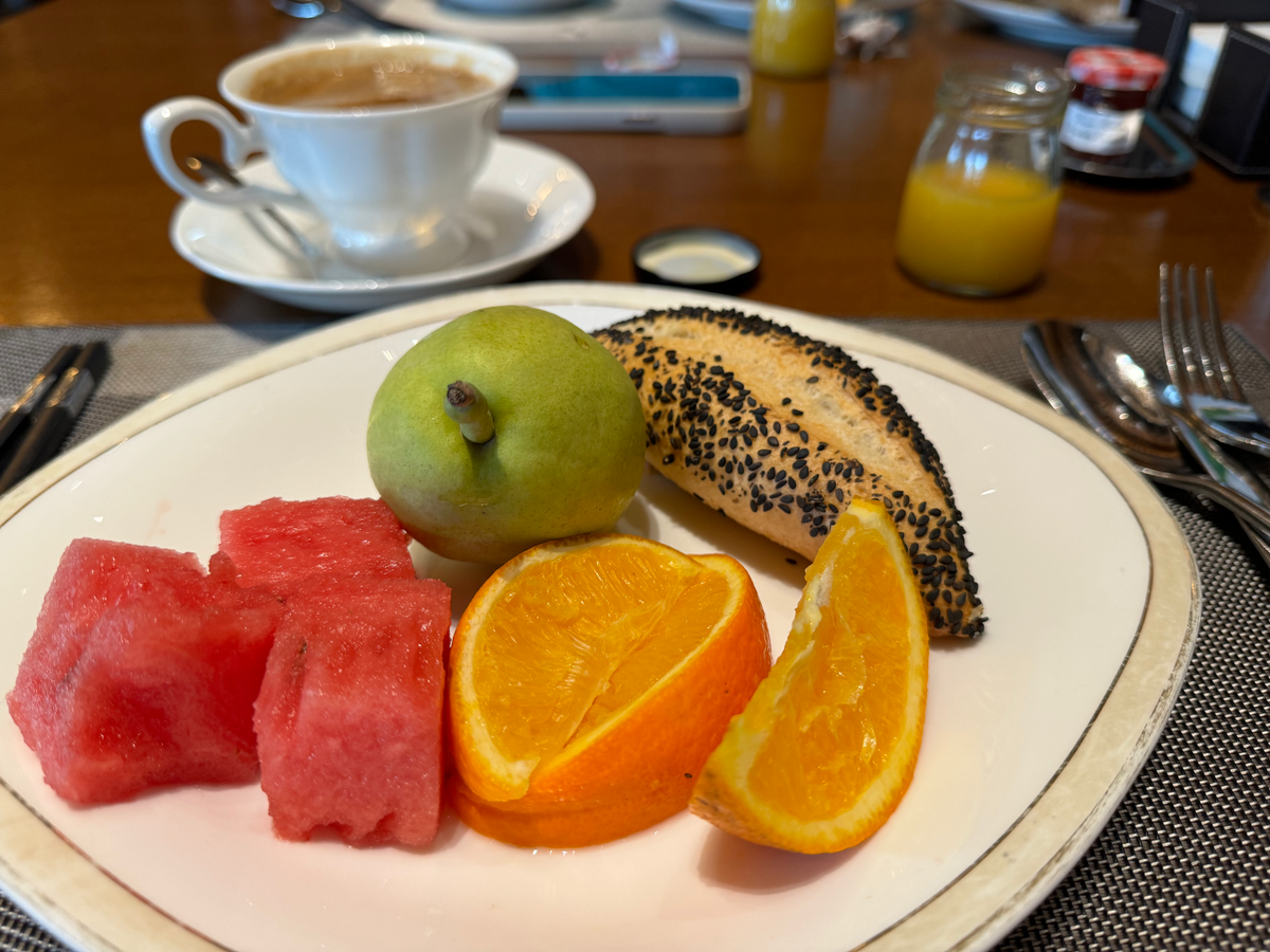 St Regis Lhasa Social fruit and bread on plate