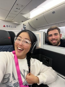 Stella redeemed regional upgrade certificates to get Delta One from Atlanta to Phoenix.
