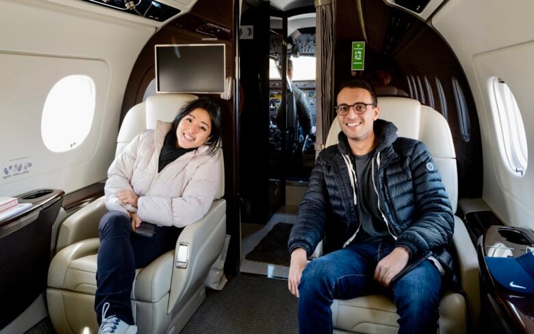 Stella with former coworker on private jet