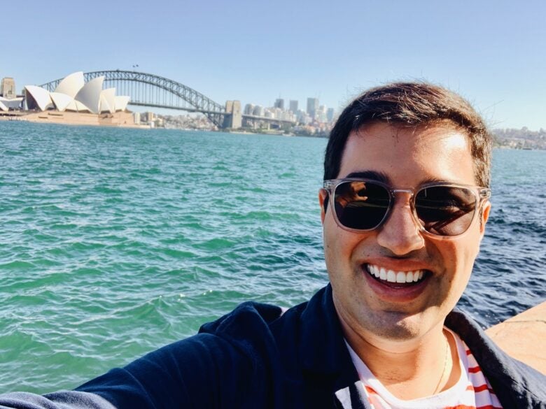 All smiles Down Under with a view of the Sydney Opera House and Harbour Bridge!