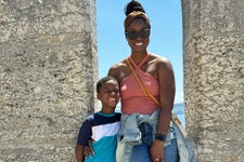 Ashley and her son at Belem Tower in Lisbon, Portugal.