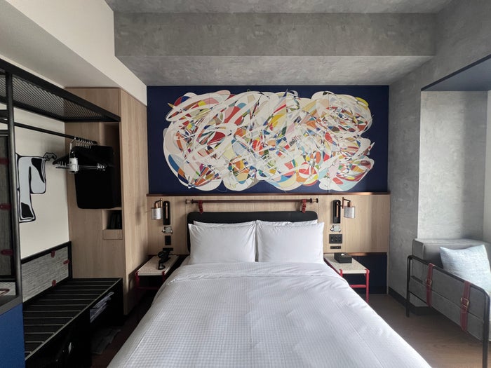 Caption by Hyatt Namba Osaka lobby restaurant Caption by Hyatt Namba Osaka room bed and artwork