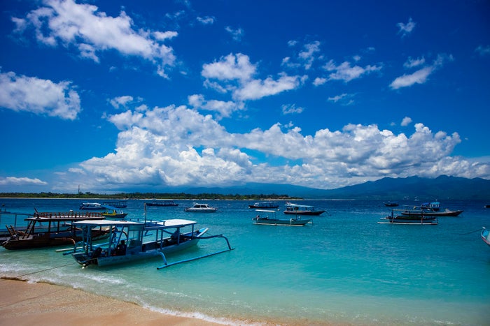 Indonesia Boats in blue water