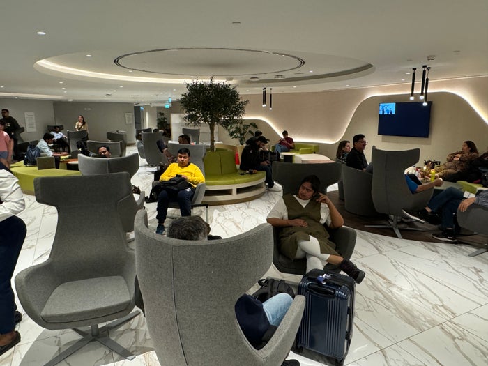 Pearl Lounge AUH seating area around tree Pearl Lounge AUH seating area around tree