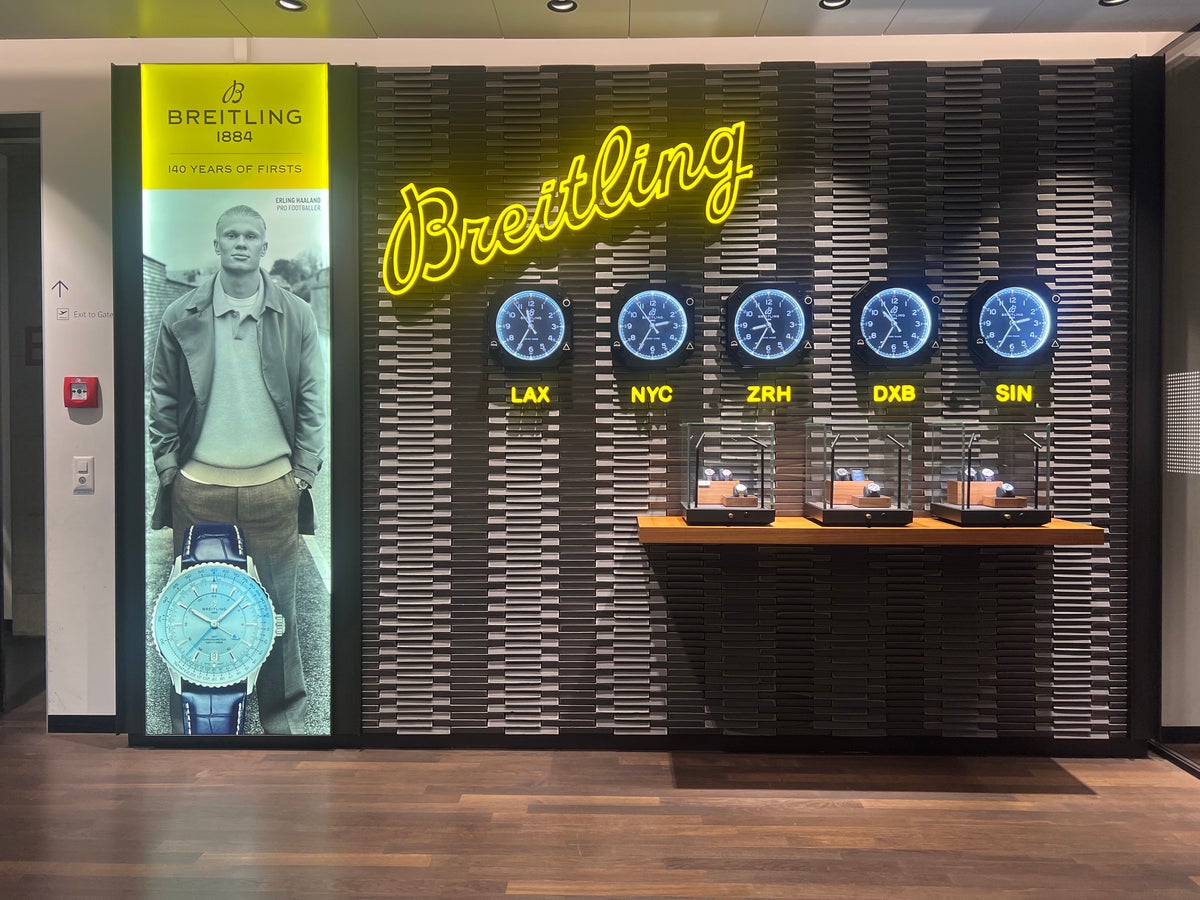 Swiss Business Class Lounge Zurich Breitling clock display