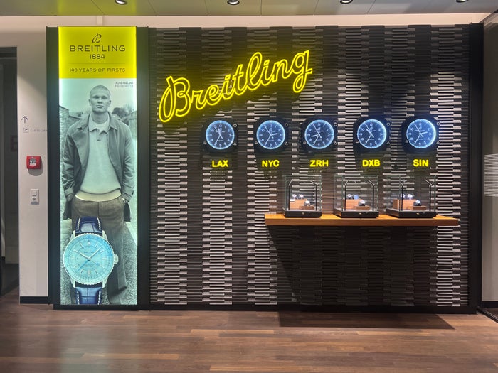 Swiss Business Class Lounge Zurich Breitling clock display