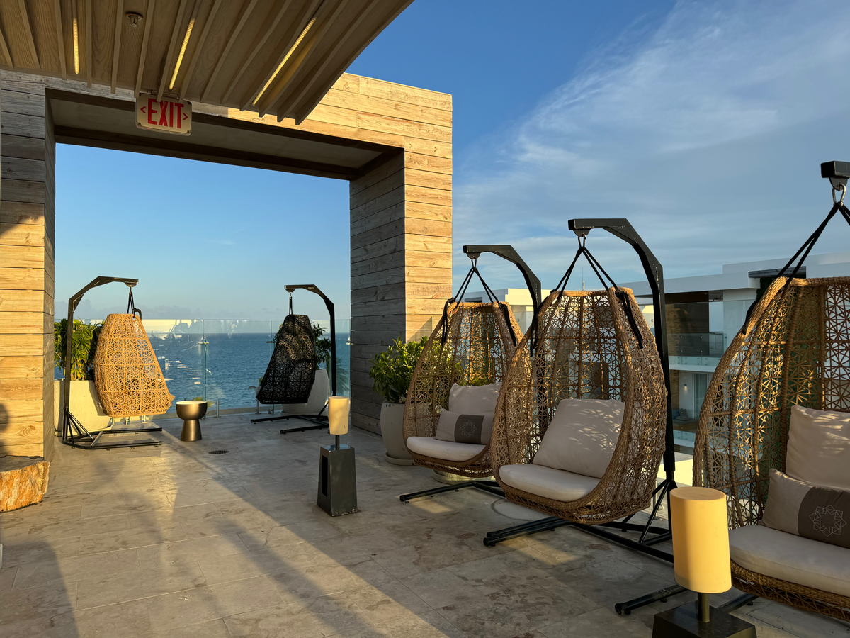 Alaia Belize Autograph Collection rooftop swing chairs