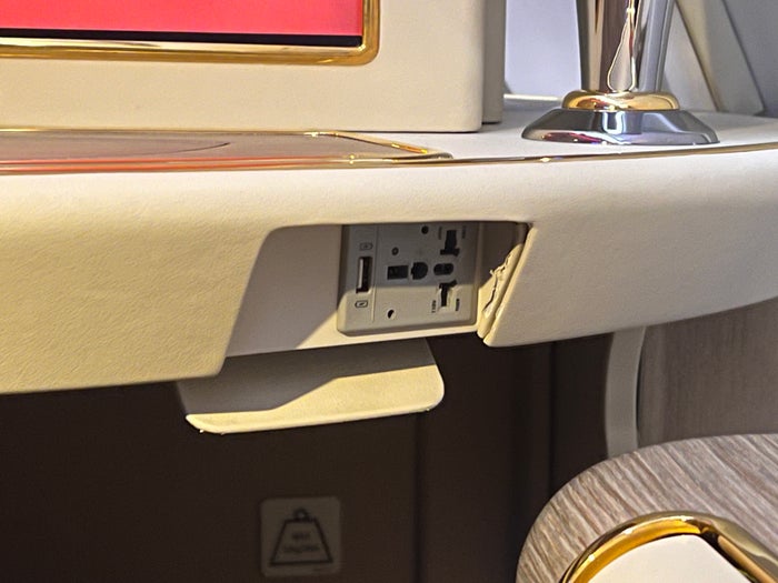 Emirates First A380 seat AC power outlet Emirates First A380 seat AC power outlet