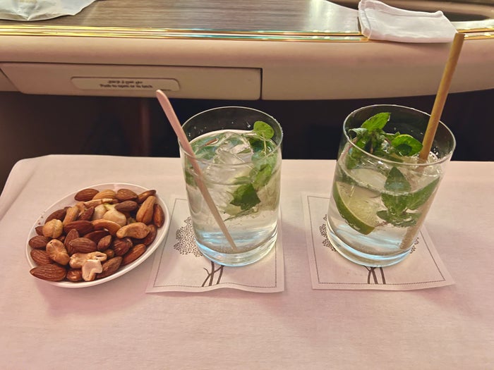 Emirates First A380 welcome drink and nuts Emirates First A380 welcome drink and nuts