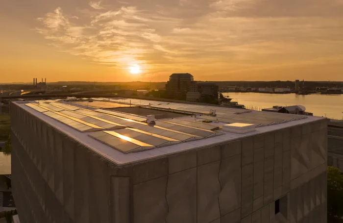 The Hotel Marcel Hilton New Hampshire Hotel Marcel New Haven Tapestry Collection by Hilton Sustainable Rooftop Solar Panels at Sunrise