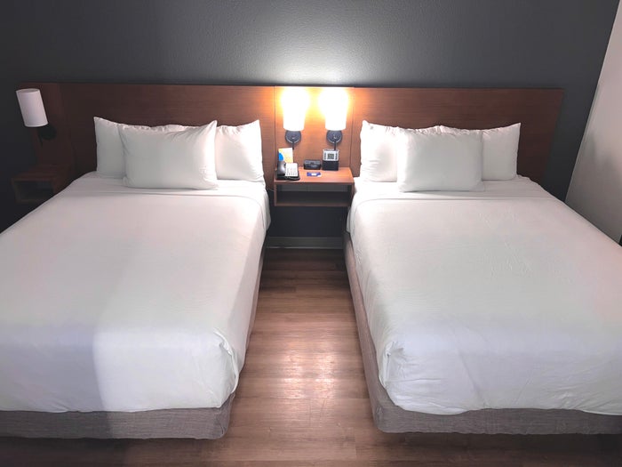 Hyatt Place Orlando Airport room beds front view Hyatt Place Orlando Airport room beds front view