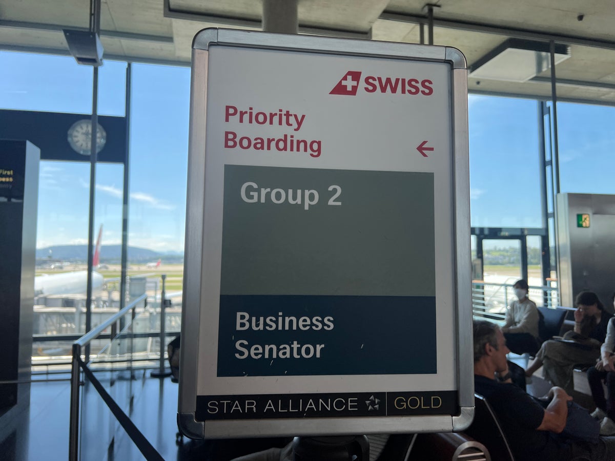 Swiss 777 business class priority boarding lines sign