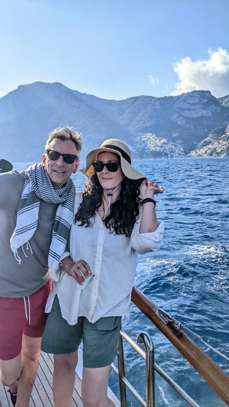 Alberto and his wife sailing off Positano, Italy