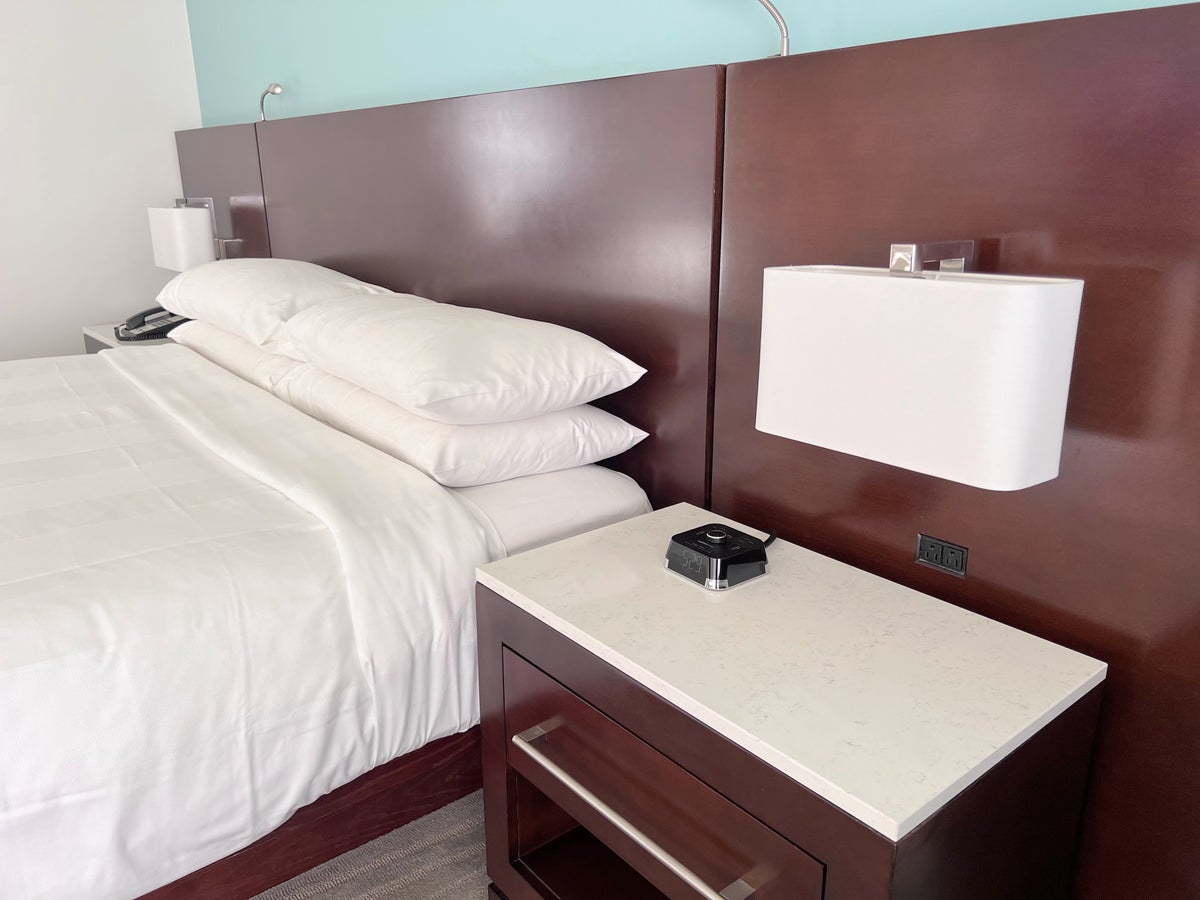 Bed and nightstand at Aruba Marriott Resort