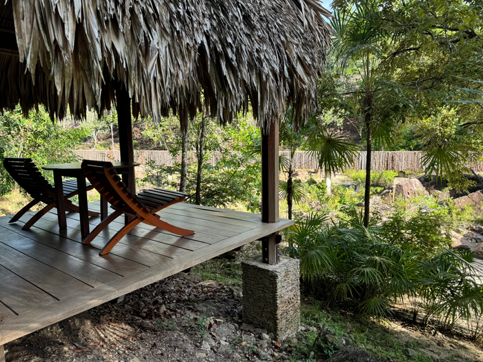 Blancaneaux Lodge Belize Mr Mrs Smith outside area chairs Blancaneaux Lodge Belize Mr Mrs Smith outside area chairs