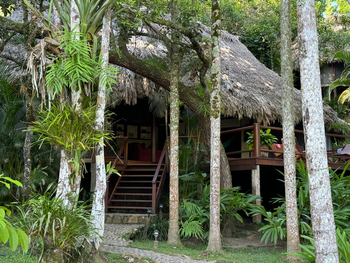 Blancaneaux Lodge Belize Mr Mrs Smith riverfront cabana outside view Blancaneaux Lodge Belize Mr Mrs Smith riverfront cabana outside view