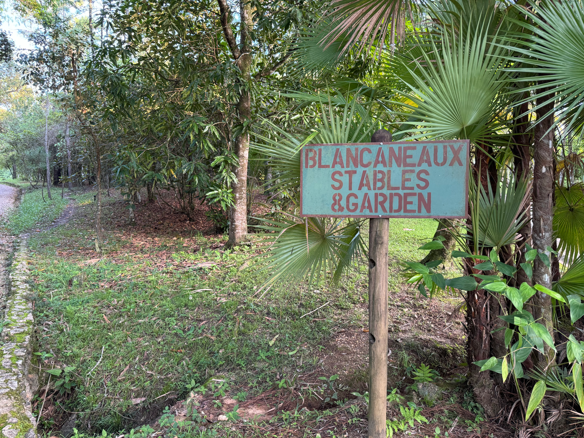 Blancaneaux Lodge Belize Mr Mrs Smith stables and garden sign