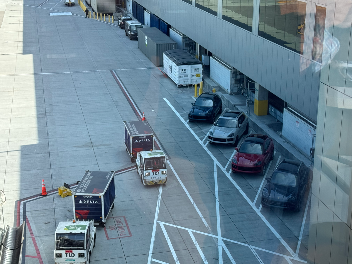 Delta One Lounge LAX Sushi Bar views of Porsche vehicles