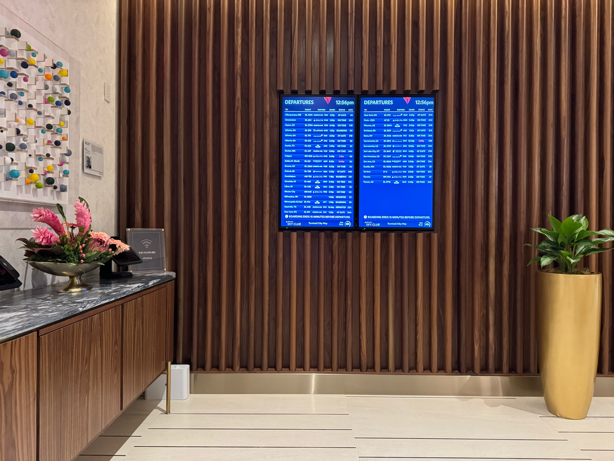 Delta One Lounge LAX departures boards at entrance