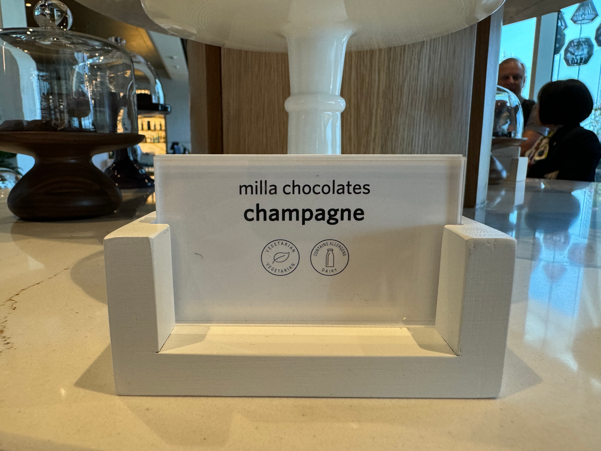 Delta One Lounge LAX dessert table sign