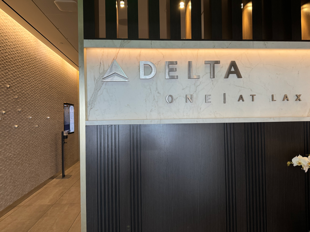 Delta One Lounge LAX sign inside door