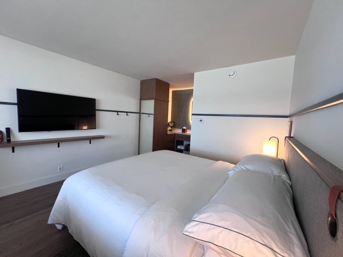 Monterey Beach Hotel guest room bed and TV Monterey Beach Hotel guest room bed and TV