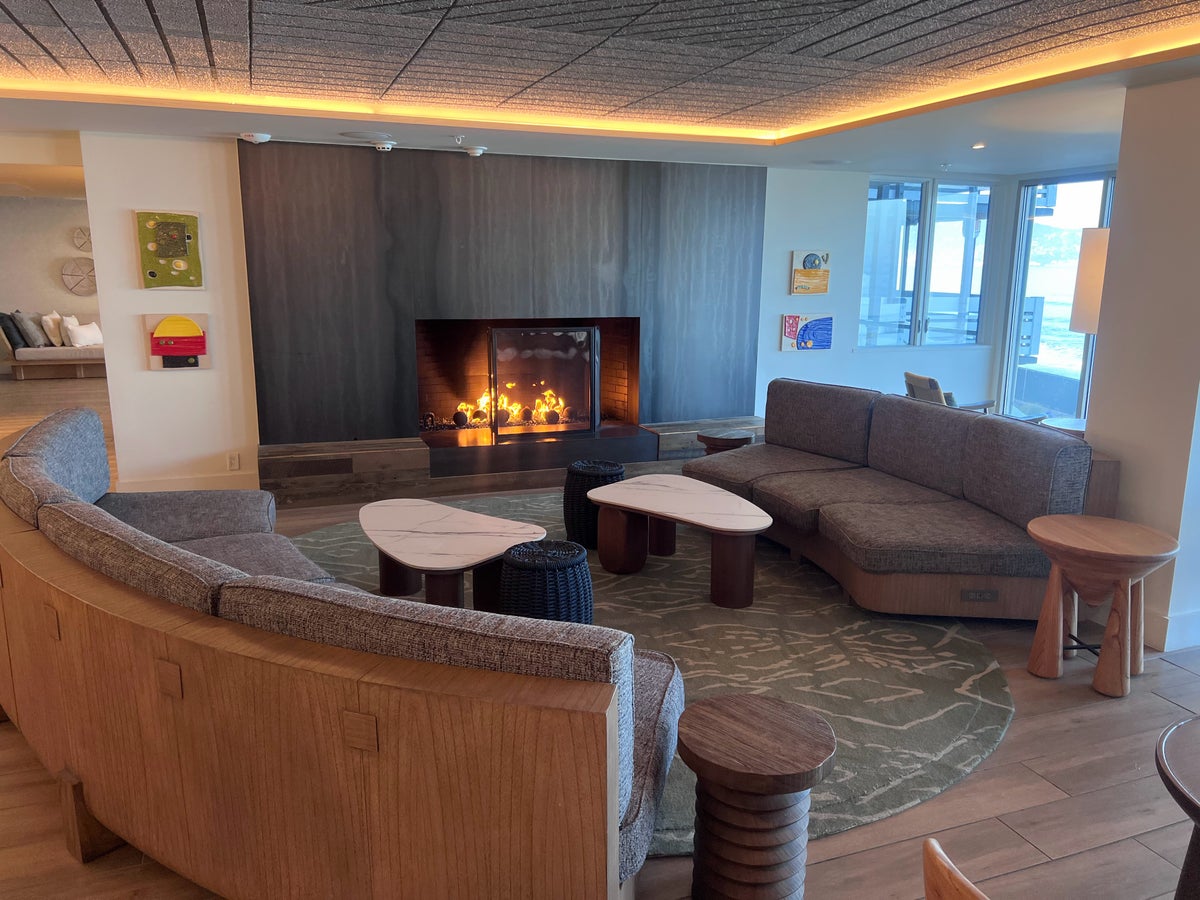 Monterey Beach hotel lobby fireplace and couches