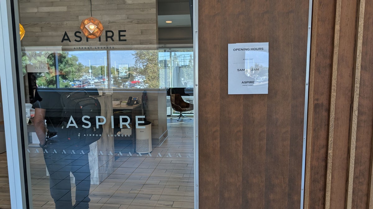 ONT Terminal 2 Aspire Lounge entrance door and hours